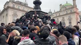 UK rapper Digga D films music video in London's Piccadilly Circus with his fans