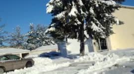 Snow clearing during heavy snowfall . Road clearing after heavy snowfall