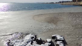 Boston Thawing Out From February Deep Freeze - Slushy Salt Water and Ice