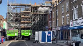 Large scaffold structure protects buildings from collapsing on Stoke Newington High Street, London