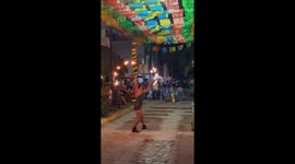 Female fire dancer performing her amazing skills while dancing in Mexico