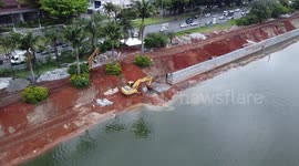 Drone travels along the banks of the Pinheiros River in Sao Paulo, Brazil