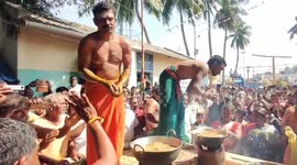 Ritual sees devotees pluck snacks from boiling oil in Tamil Nadu, India