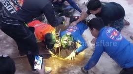 Race to save girl, one, stuck overnight in 50ft deep well in northern Thailand