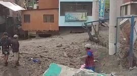 Peru landslide kills 36 as muddy floods surge through homes