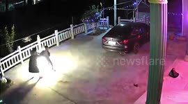 Chinese mum removes coat from daughter's back after lit firework ignites it