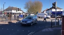 Accident of 2 vehicles colliding at a junction in Heath, Cardiff, with police arriving momentarily before the video started
