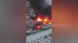Flames erupt from massive pile-up caused by snow on Chinese road