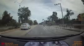 Bungling driver crashes onto scooter when he tried to beat red light at junction