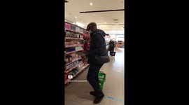 man dacing in shop