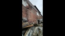 Fire damaged building roof sheeting and steel damaged by fire in South Africa