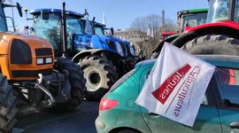 French farmers roll their tractors into Paris in protest over pesticide bans