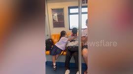 Sweet schoolgirl helps big sister sleep comfortably inside train