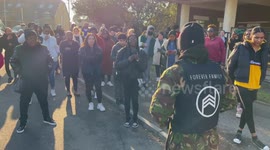 Angry locals gather outside UK school where Black schoolgirl attacked by gang