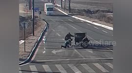 Truck driver stops out-of-control tractor doing doughnuts on road