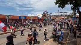 Peaceful protesters marching in major streets of Cusco, Peru.