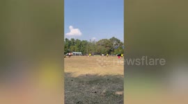 Dust devil tornado whips through soccer pitch before uprooting team tent