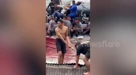 Indonesia earthquake kills four as floating restaurant collapses into sea