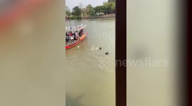 Passengers watch schoolchildren drowning in river before youngster jumps in to save them