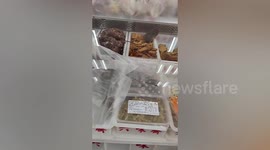 Rat spotted running inside food counter at Chinese supermarket