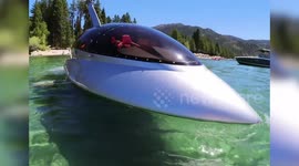 Wacky new vehicle lets you zip through the water - in a SHARK