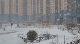 Snowstorm covers St Petersburg in snow with almost no view on the roads, Russia