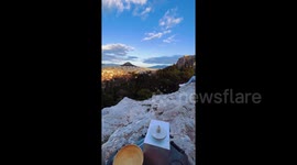 Artist takes her pottery wheel to stunning locations for some miniature creations