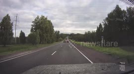 Hit and Run: Road Incident on Suburban Highway Between Two Vehicles