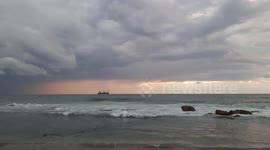 Sea shore and amazing weather, clouds in the sky with unique colors merging together, I took this video to record a beautiful peaceful moment