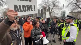 Pro and anti trans activists face off outside Tate Britain