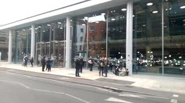 London's ITV building covered with stickers reading 'the media is the virus'
