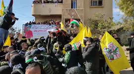 Mourners carry the body of Mithkal Suleiman Rayyan, 27, shot dead during a clash with Jewish settlers, during his funeral
