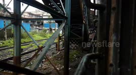 Mumbai local train in India . Mumbai local train rush at  railway station . Rush hour at train station in India