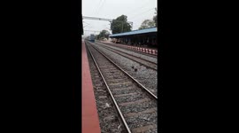 TRAIN PASSING ON STATION. HIGH SPEED  TRAINS OF INDIAN RAILWAYS  .FULL LOADED MALL GAADI PASSING THE RAILY STATION