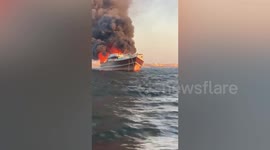 Cargo ship carrying vehicles catches fire after explosion at Oman port
