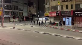 Clashes between Palestinian protesters and Israeli soldiers during an Israeli military raid