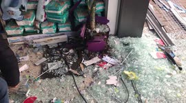 Palestinians inspect damages to pharmacy after Israeli army raid in Nablus