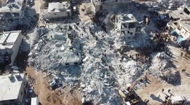 Drone footage shows scale of earthquake destruction as numerous buildings razed in Syrian town