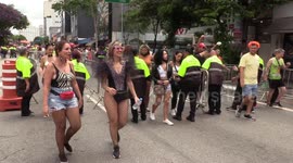 Revelers take part in pre-carnival parades in Sao Paulo, Brazil