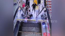Boy's hand gets stuck in escalator at Chinese mall