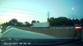 Accident: Car Hits a Flying Tire and Crashes into a Divider