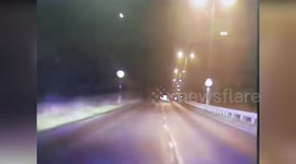 Cop Car In London, UK On Emergency Call Films Meteor Crashing To Earth
