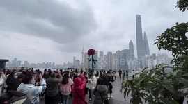 Giant rose statue attracts Chinese residents to take photos ahead of Valentine's Day