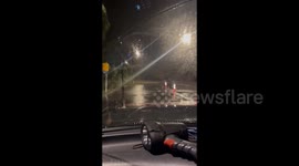 Severely flooded road in Auckland, New Zealand