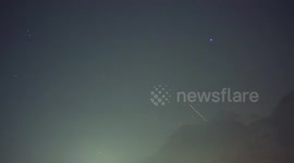 Photographer captures Starlink satellite train ascending above Alps and into space