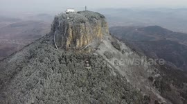 Snow-covered Baodugu National Forest Park in Zaozhuang, China