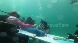 Couples celebrate underwater weddings on Valentine's Day in Thailand