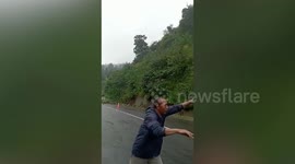Landslide blocks roads amid heavy rain and floods in Indonesia