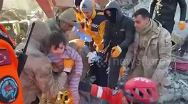 Child survivor smiles as she's pulled from Turkey earthquake rubble