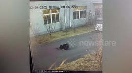 Chinese man falls into manhole after attempting to fix cover with his foot